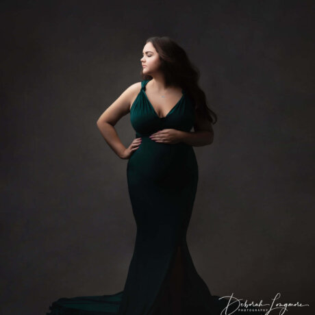woman posed in infinity maternity dress by rosa amour