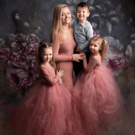 family portrait daughters and mother wearing pink rosa amour dresses