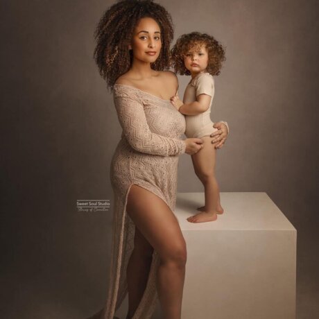 Mother and child posed wearing rosa amour crochet dress